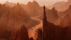 Off-road vehicles driving through red sandstone canyon formations in Xinjiang